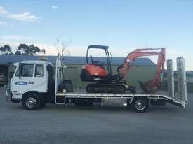 2015 Kubota, Mini Excavator low hours and 2004 UD MK Beavertail Truck Both Excellent cond.low kms - picture0' - Click to enlarge
