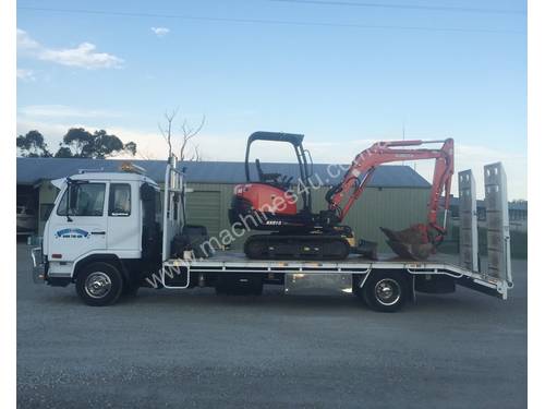 2015 Kubota, Mini Excavator low hours and 2004 UD MK Beavertail Truck Both Excellent cond.low kms