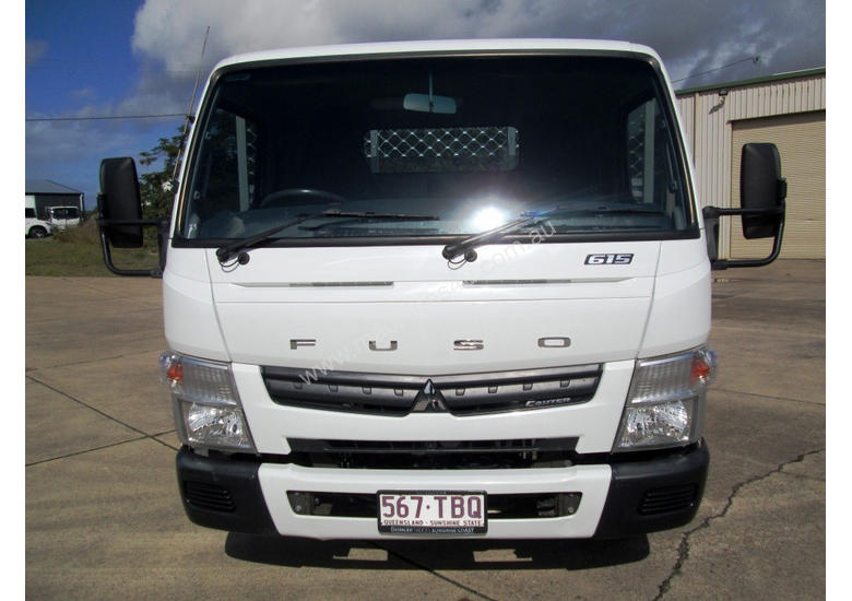 caption Mitsubishi Canter 615 Tray Truck