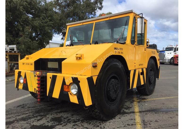 caption Douglas Tugmaster DC 10/4 Tow Tug