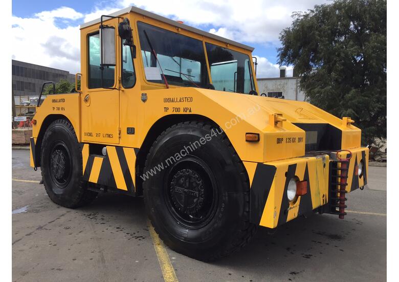caption Douglas Tugmaster DC 10/4 Tow Tug