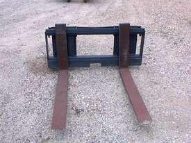 Fork attachment suit skid steer loaders - picture0' - Click to enlarge