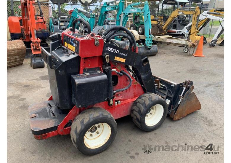 caption TORO W320 MINI SKID STEER LOADER