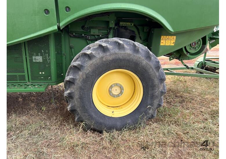 caption 2015 JOHN DEERE S670 w JOHN DEERE 640D Front