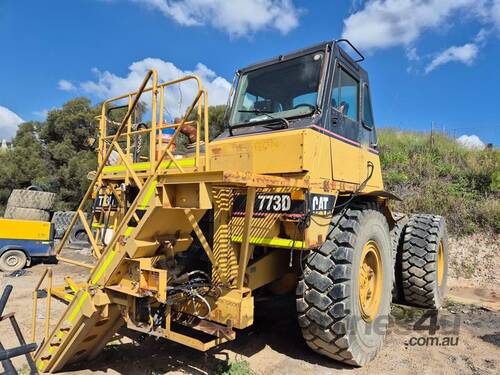 CATERPILLAR 773 D DUMP TRUCK W/ 2 X HAUL BACKS 