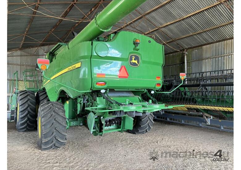 caption 2021 John Deere S780 Combines