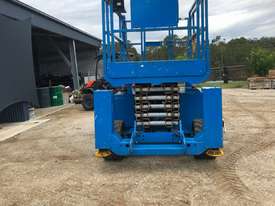 Genie GS3268RT  Rough Terrain Scissor lift in time till 2021 - picture2' - Click to enlarge