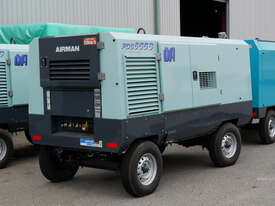 AIRMAN PDS655SD-4B2: 655cfm Portable Diesel Compressor on Wagon Wheels  - picture0' - Click to enlarge