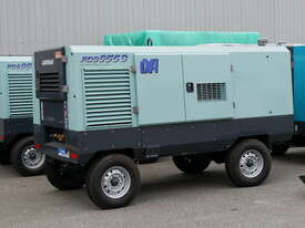 AIRMAN PDS655SD-4B2: 655cfm Portable Diesel Compressor on Wagon Wheels  - picture0' - Click to enlarge