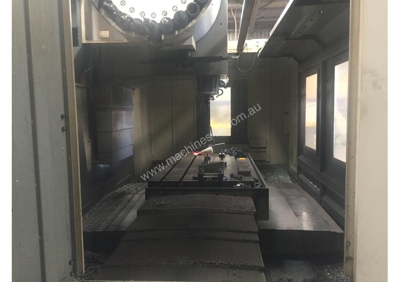 caption CNC VERTICAL MACHINING CENTRE