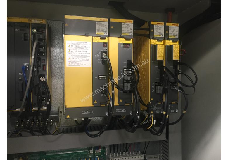caption CNC VERTICAL MACHINING CENTRE