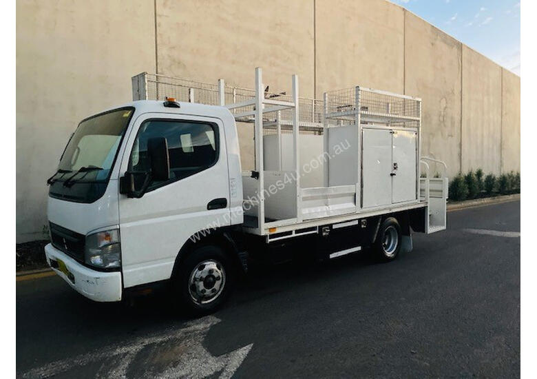 caption Mitsubishi Canter Service Body Truck