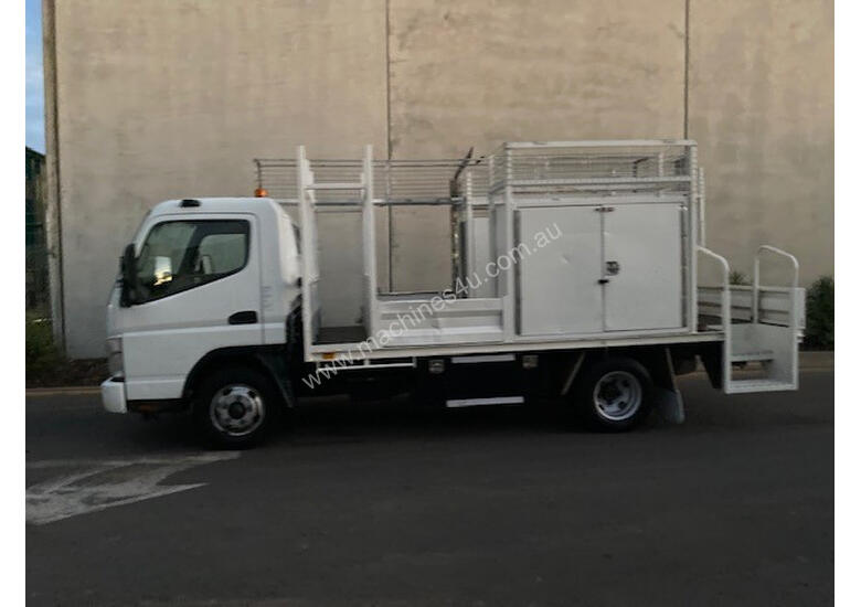 caption Mitsubishi Canter Service Body Truck