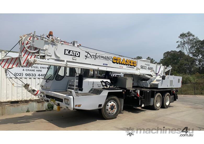 caption 1990 Kato Hydraulic Truck Crane