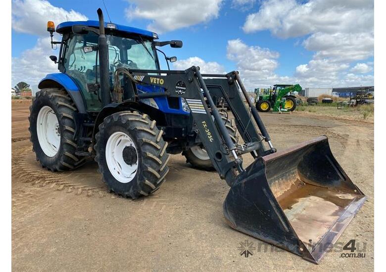 Used New Holland TS110A Tractor With Front End Loader in , Listed on