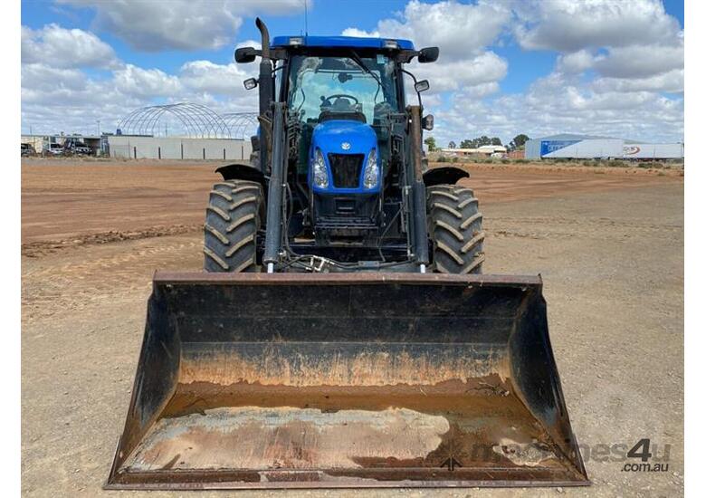 Used New Holland TS110A Tractor With Front End Loader in , Listed on
