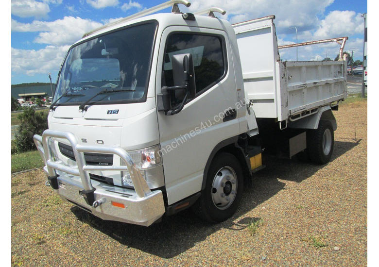 caption Mitsubishi Canter 715 Tipper Truck