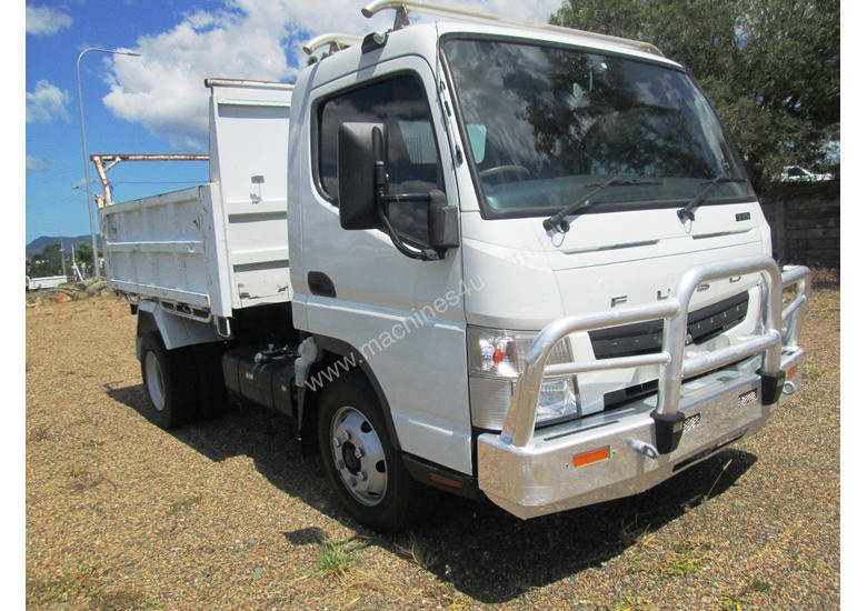caption Mitsubishi Canter 715 Tipper Truck