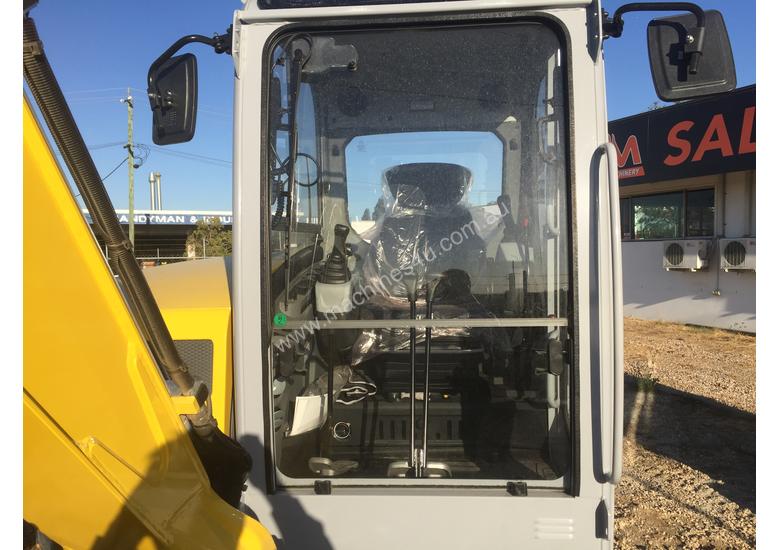 caption Wacker Neuson EZ53 Excavator - Outrageously Powerful