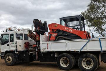 PACIFIC ENERGY GROUP -   - Combo Truck and Trailer with Excavator & Skid Steer Loader