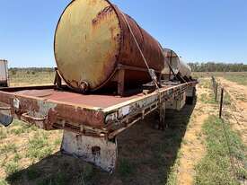 40 FOOT FLAT TOP BOGEY AXLE TRAILER WITH TANKS.  - picture1' - Click to enlarge