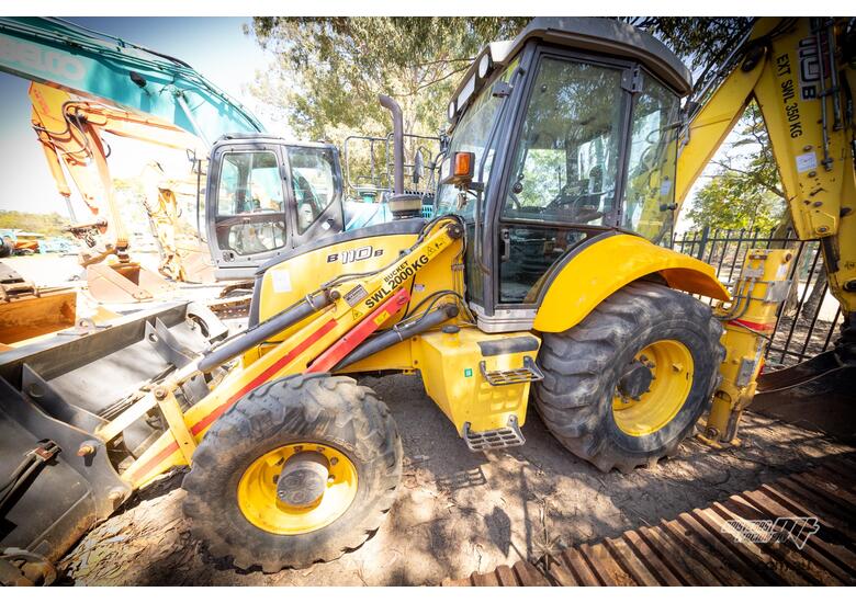 caption NEW HOLLAND B110B BACKHOE