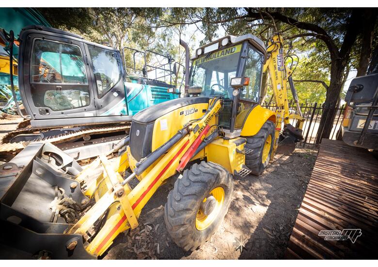 caption NEW HOLLAND B110B BACKHOE