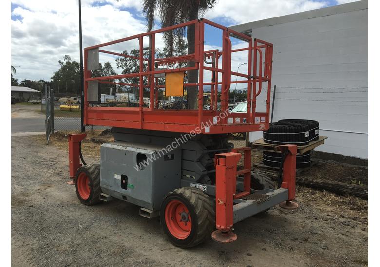 caption Rough Terrain Scissor lift 1600 hours Including Auto Levelling. A