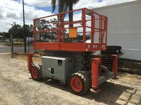 Rough Terrain Scissor lift 1600 hours Including Auto Levelling. A - picture0' - Click to enlarge