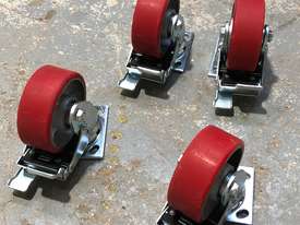 Four (4) 125mm Ball Bearing Industrial Swivel Casters with brakes - picture0' - Click to enlarge