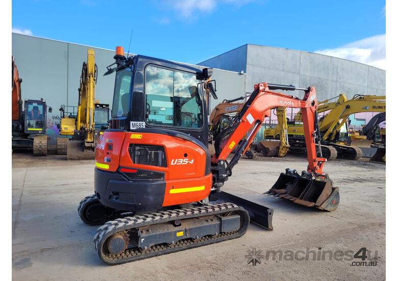 caption USED 2021 KUBOTA U35-4 EXCAVATOR WITH A/C CAB, HITCH, BUCKETS AND LOW 560 HOURS