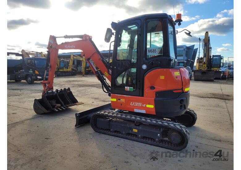 caption USED 2021 KUBOTA U35-4 EXCAVATOR WITH A/C CAB, HITCH, BUCKETS AND LOW 560 HOURS