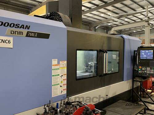 Barely Used Doosan Vertical Milling Machine Centre with 4th Axis and OMP Probe 