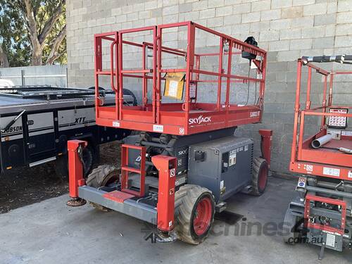 caption Financier's 2023 Skyjack SJ6832 RT 4x4 Scissor Lift