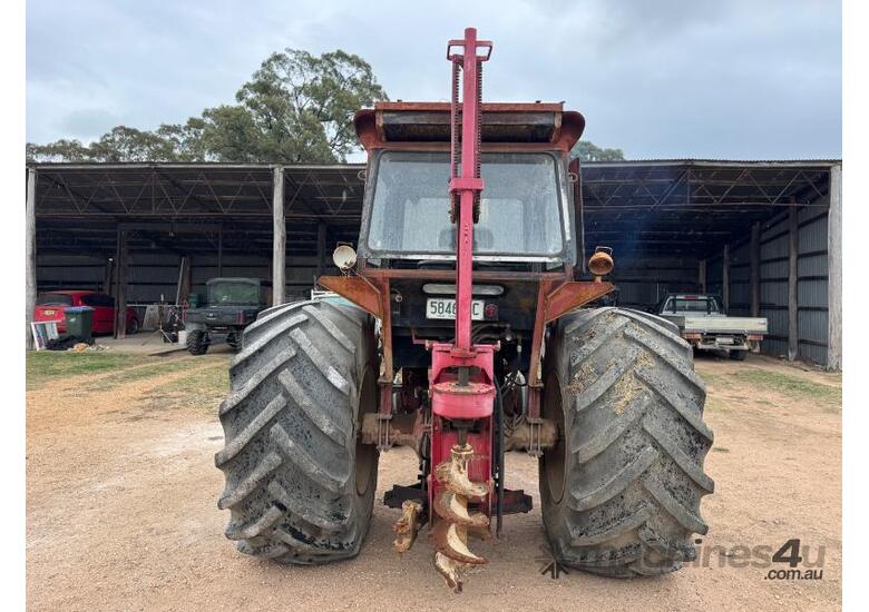 caption International 766 Tractor, Forklift Attachment and Post Hole Digger