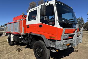 Isuzu FTS750 Crew 4x4 Dualcab Traytop Firetruck. Ex NSW Rural Fire Service. Isuzu FTS750 Crew 4x4 Dualcab Traytop Firetruck. Ex NSW Rural Fire Service.