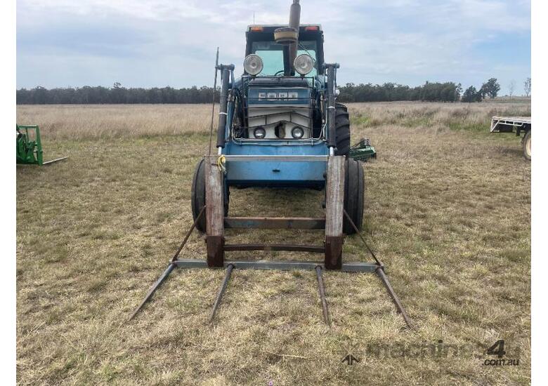 Ford 8401 Tractor, Air Cond cab, 3PL, indicating 10,545 hours, hay spears and GP bucket