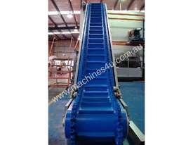 L-Shape Inclined Cleated Belt Conveyor with Wave Edge - picture1' - Click to enlarge