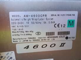 AW-4600CPR is a fully automatic, integrated weigh/wrap/label system for meat/food in line wrapping - picture1' - Click to enlarge