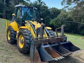 New Holland backhoe LB115.B loader 4x4 with hammer attachment. Similar to JCB 4CX. - picture0' - Click to enlarge