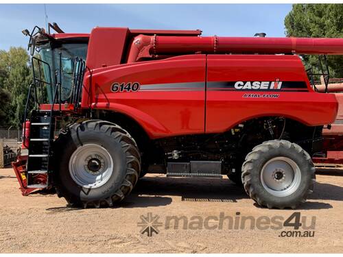 caption Case IH 6140 Axial Flow Combine & MacDon FD135 Front