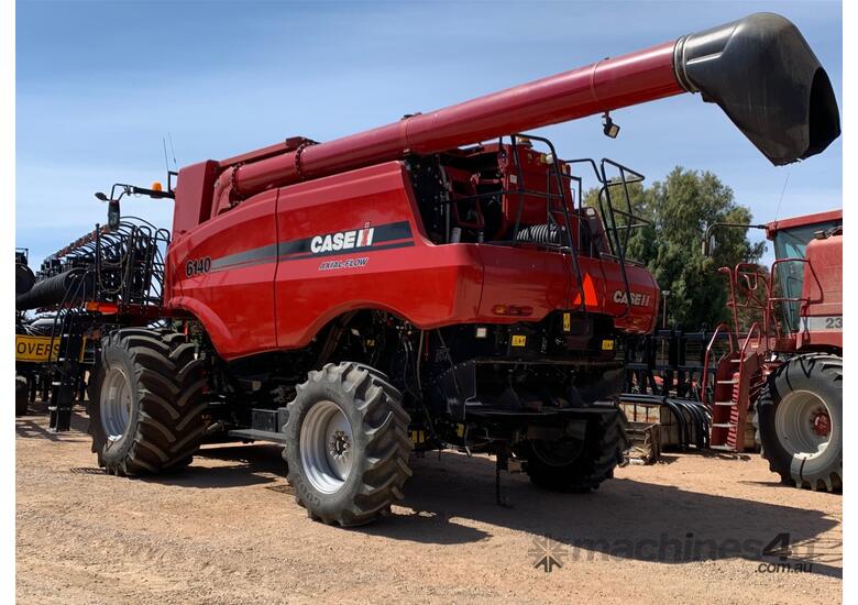 caption Case IH 6140 Axial Flow Combine & MacDon FD135 Front