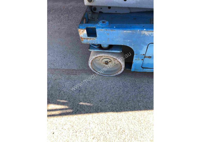 caption SCISSOR LIFT GENIE 26FT USED - GS2646