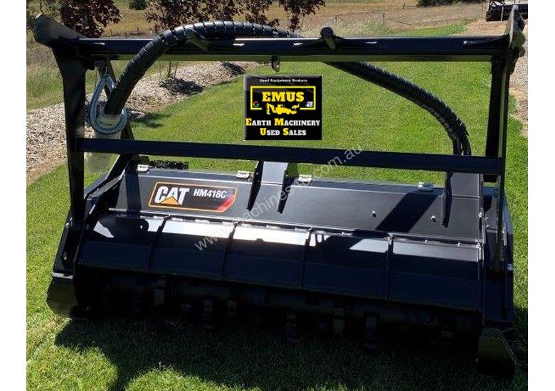 caption 2018 CAT Skid Steer Mulcher, never used. E.M.U.S. AS189