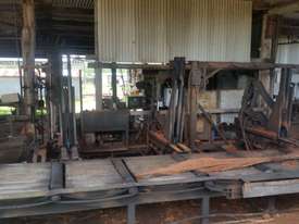 Gibson Power Feeder and Log Roller Bench - $ Make an Offer - picture0' - Click to enlarge