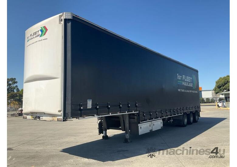 caption 2022 Tiger Semi Trailers ST3 Tri Axle Drop Deck Curtainside B Trailer