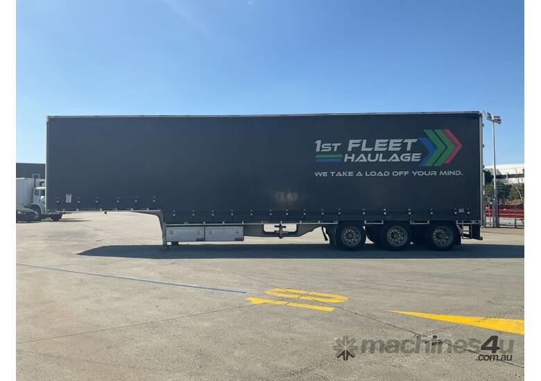 caption 2022 Tiger Semi Trailers ST3 Tri Axle Drop Deck Curtainside B Trailer