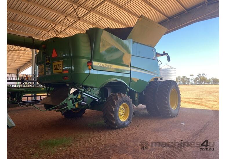 caption 2021 John Deere S780 Combines