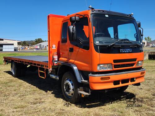 caption Isuzu FTR900 Long 4x2 Traytop Truck. One Fleet Owner