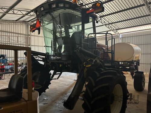 caption 2015 MACDON M155 WINDROWER & 2016 D65 35' SWATHER FRONT